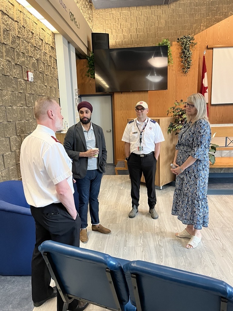 some government officials taking on a guided tour at WCOH