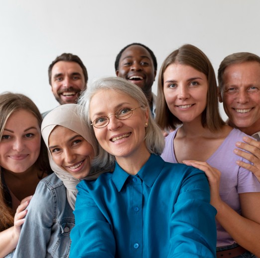 Group of adults and seniors smiling